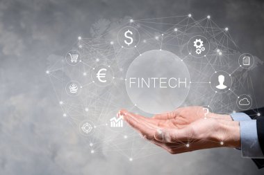 Fintech-Finansal Teknoloji konsepti işadamında. Yatırım bankacılığı ödemesi. Kripto para yatırımı ve dijital para. Sanal ekranda iş kavramı