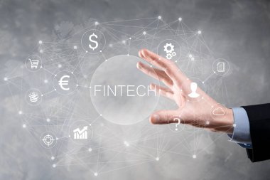 Fintech-Finansal Teknoloji konsepti işadamında. Yatırım bankacılığı ödemesi. Kripto para yatırımı ve dijital para. Sanal ekranda iş kavramı