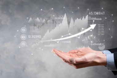 Elde tutulan satış verileri ve ekonomik büyüme grafiği. İş planlama ve strateji. Takas ticareti analiz ediliyor. Finansal ve bankacılık. Teknoloji dijital pazarlama. Kâr ve büyüyen plan.