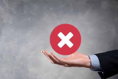 Elle tutulan simge, iptal simgesi, simgeyi iptal et. Düz kırmızı simge işaretle. round. round.round.round. X işareti iptal. Yanlış işaretleme. Reddedildi. Koyu arkaplanda.banner. Boşluk. Metin için yer