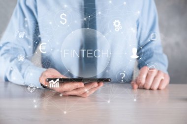 Fintech-Finansal Teknoloji konsepti işadamında. Yatırım bankacılığı ödemesi. Kripto para yatırımı ve dijital para. Sanal ekranda iş kavramı