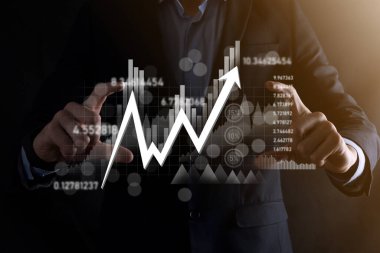 Elde tutulan satış verileri ve ekonomik büyüme grafiği. İş planlama ve strateji. Takas ticareti analiz ediliyor. Finansal ve bankacılık. Teknoloji dijital pazarlama. Kâr ve büyüyen plan.