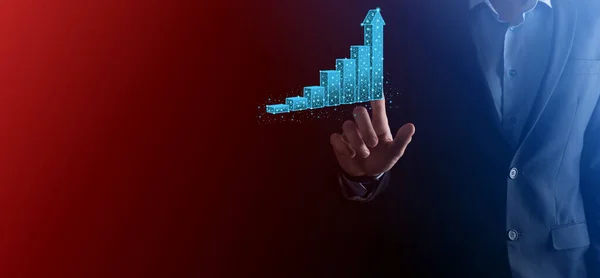 Business man holding 3D graphs low polygonal and stock market statistics gain profits. Concept of growth planning,business strategy.economic growing concept.Business strategy. Digital marketing