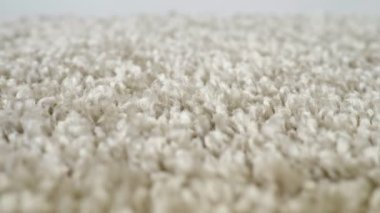 Beyaz halı kamera hareketinin yakın plan görüntüleri