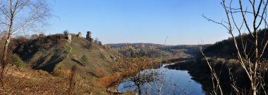 picturesque panoram with river and old ruins clipart
