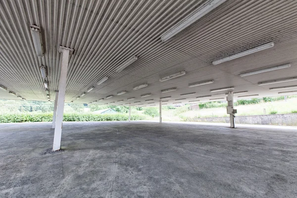 Empty commerical business premises with large concrete floor