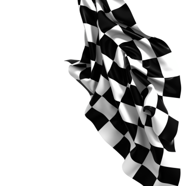 Rüzgardaki kareli bayrak dalgaları zaferin ve bitiş çizgisinin sembolü.