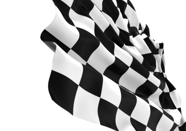 Rüzgardaki kareli bayrak dalgaları yarışın sonunu simgeliyor.