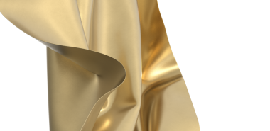 Pürüzsüz yüzeyi ve şık dokuları olan zarif altın kumaş.