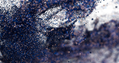 Mavi ve altın bokeh efektli soyut parçacık patlaması