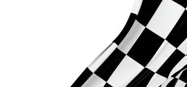 Beyaz Arkaplanda Damalı Bayrak Dalgalanması, Zafer ve Hızı Sembolize Ediyor