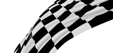 Zafer ve başarıyı kutlamak için rüzgarda dalgalanan kareli bayrak.