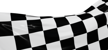 Damalı bayrak gururla sallanıyor, hızı, zaferi ve rekabeti simgeliyor