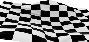 Kazanmanın sembolü olarak rüzgarda dalgalanan kareli bayrak