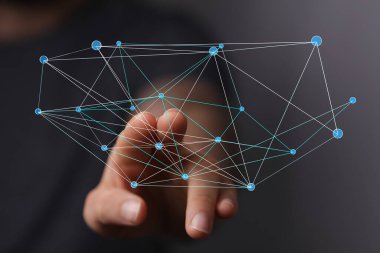 İnsan eli dijital bir ağa dokunuyor, dünyayı birbirine bağlıyor..
