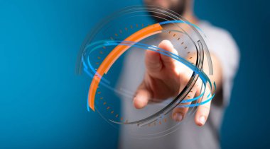 İnsanın eli dijital arayüzü işaret ederek teknolojiyi sembolize ediyor