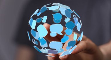 Eldeki Konuşma Baloncukları Küresel İletişimi temsil ediyor