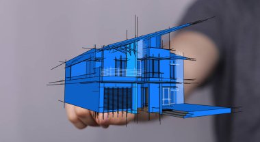 Mimari tasarım mavi ev çizimi elinde yüzüyor.