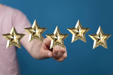 Değerlendirme, geri bildirim ve değerlendirme için beş altın yıldıza dokunmak.