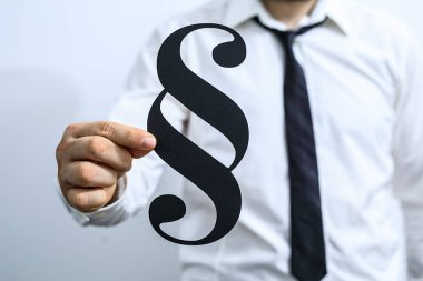 İşadamı Paragraf Sembol Hukuki Kavramını Tutuyor