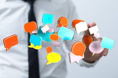 İletişim için dijital konuşma baloncukları ağı tutan iş adamı