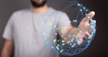 Dijital ağ küresi tutan adamın eli, küresel bağlantılar kavramı