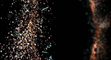 Siyah arkaplanda kopyalama alanı ile soyut yıldız ve parçacık patlaması