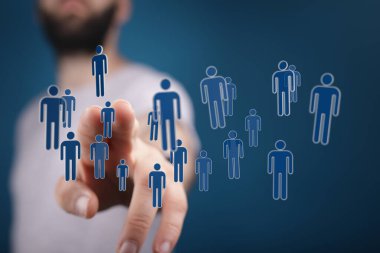 İnsanın eli dijital insan simgeleri konseptini işaret ediyor