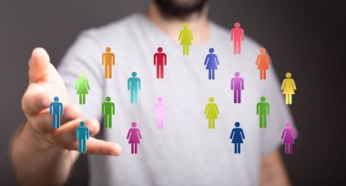 Takım çalışmasını ve sosyal etkileşimi temsil eden farklı kişilerle bağlantılı figürler