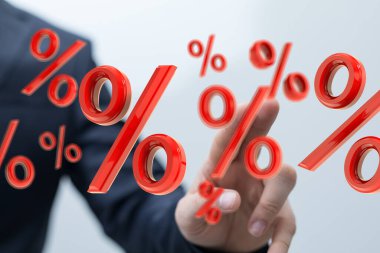Faiz Oranları: İşadamı Yüzdelik Sembolleri Ayarlıyor