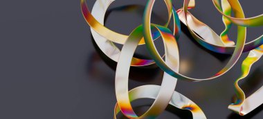 Koyu arkaplanda dönen soyut yanardöner kurdeleler