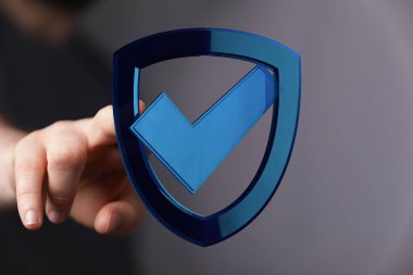 Mavi kalkanda işaretli el, güvenlik sembolü.