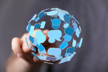 Dijital İletişim: Mavi Konuşma Baloncuklarının Elle Dokunma Küresi