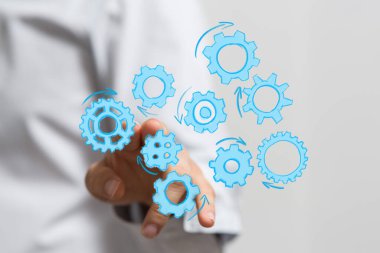 Vites sistemine, takım çalışmasına ve teknolojik çözümlere el işaretleri.