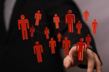 Koyu arkaplandaki çizgilerle birbirine bağlı kırmızı şekillere sahip dijital ağ