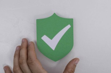 El Dokunuşu Yeşil Kalkan Güvenlik ve Koruma Konseptini sembolize ediyor