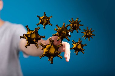 Dijital olarak temsil edilen altın virüs parçacıkları ile mavi arkaplan üzerinde insan etkileşimi