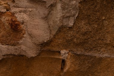 Eski bir duvarın eskimiş dokusunu.