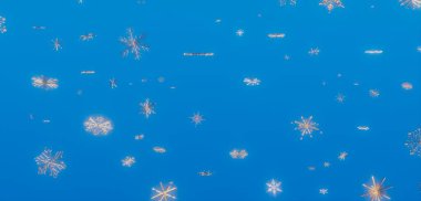 Mavi Arkaplana Düşen Gümüş Kar Taneleri