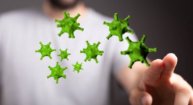 İnsan eliyle etkileşen virüs parçacıklarının kavramsal görüntüsü