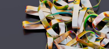 Soyut yanardöner metalik kurdeleler birbirine dolanmış.