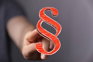 İnsan Eli Kırmızı Sayısal Paragrafa Dokunuyor Yasayı ve Adaleti Temsil Eden Sembol