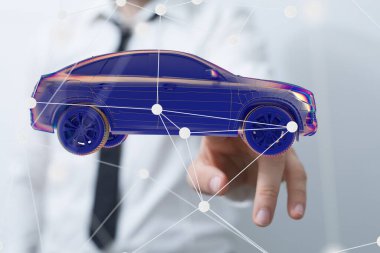 Adam holografik akıllı arabaya dokunuyor ve tutuyor.