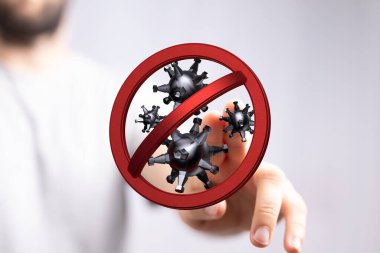Coronavirus önleme konsepti, dur işaretli virüse el işareti