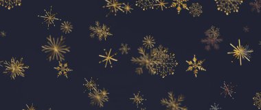 Kış tatili için koyu arkaplana düşen zarif altın kar taneleri