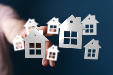 Elde tutulan kağıt evler: gayrimenkul, ipotek ve mülkiyet