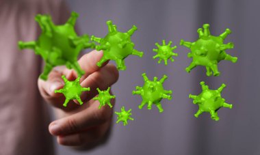 Mikroskobik Detaylı Bir El Tarafından Tutulan Yeşil Virüs Modeli