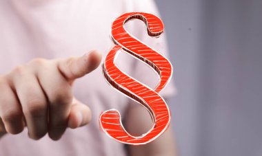 Professional Hand Interacting with Digital Legal Paragraph Symbol