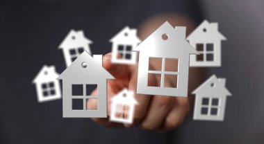 Gayrimenkul, konut piyasası ve mülkleri sembolize eden dijital olarak temsil edilen evler