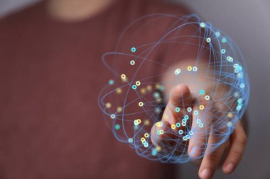 Teknolojiyi ve dünyayı temsil eden insan dokunuşuyla birbirine bağlı küresel ağ